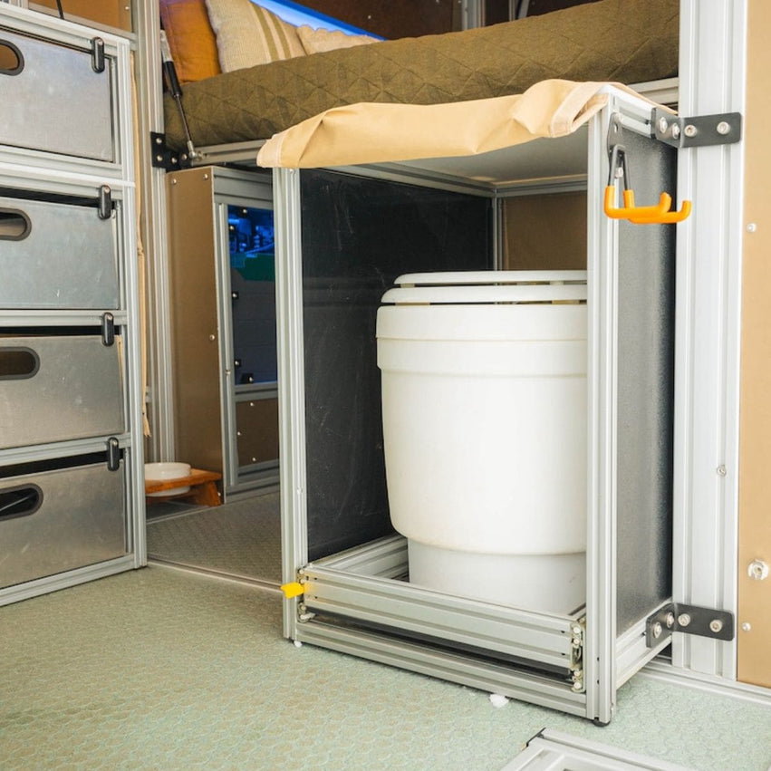 Laveo Dry Flush Toilet with a full-size seat, perfect for comfort during RV or camping trips.